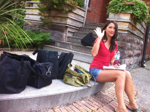 Actress Alli Chung practices her lines after arriving at the house location.